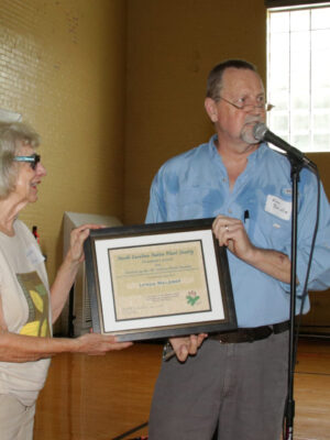 Ken Bridle honors Lynda Waldrep with the President’s Award at the NC Native Plant Society Annual Meeting