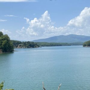 lake james in the foreground with mountains in the distance
